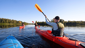 Paddler kayaking. Paddle UK offers public liability insurance.