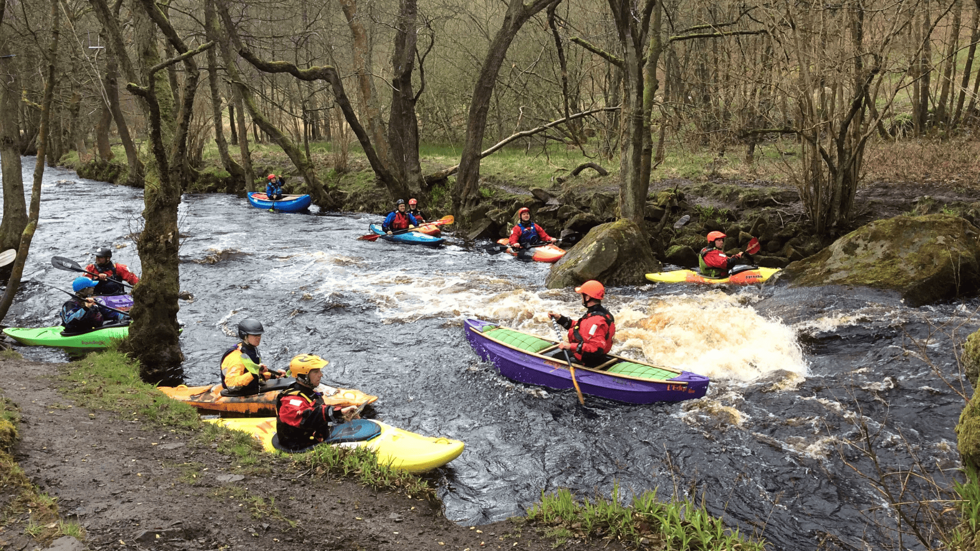 Young paddlers and a coach at Washburn.