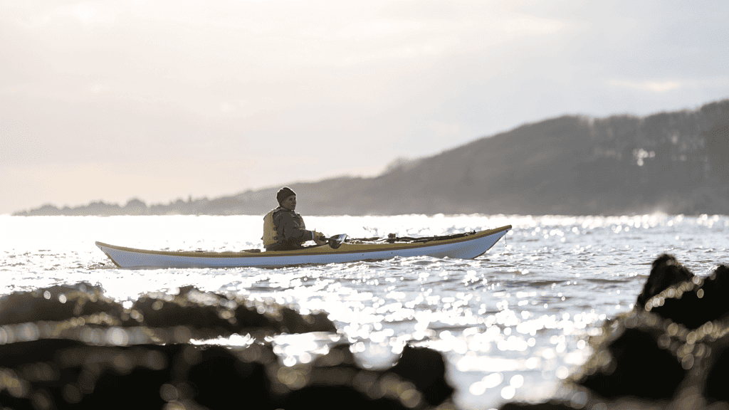 Women sea kayaking. Image used for offers and discounts page.