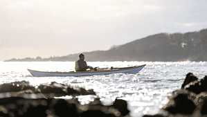 Women sea kayaking. Image used for offers and discounts page.