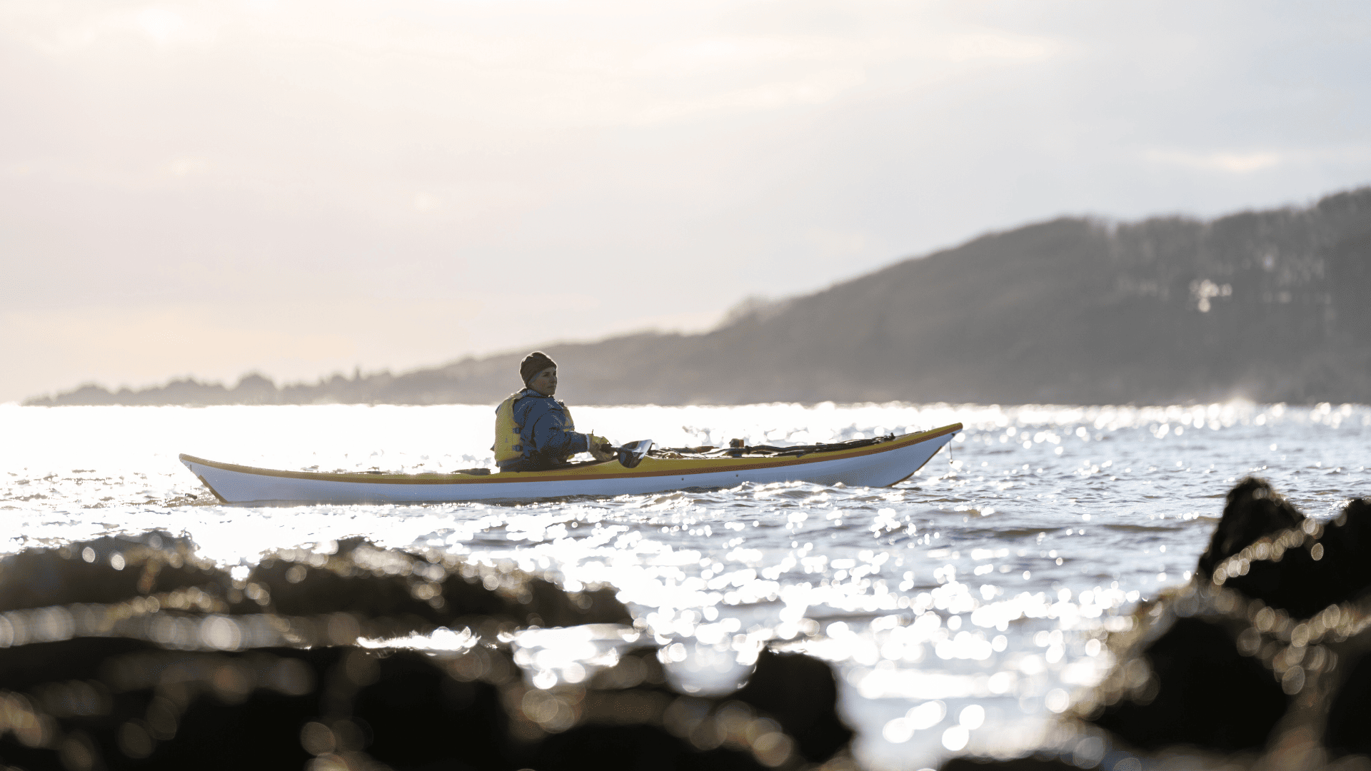 Women sea kayaking. Image used for offers and discounts page.