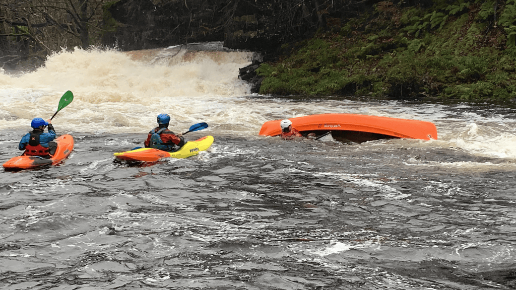 Safeguarding and Safety. Paddlers practising safety and rescue.