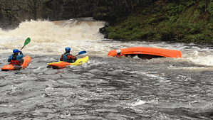 Safeguarding and Safety. Paddlers practising safety and rescue.