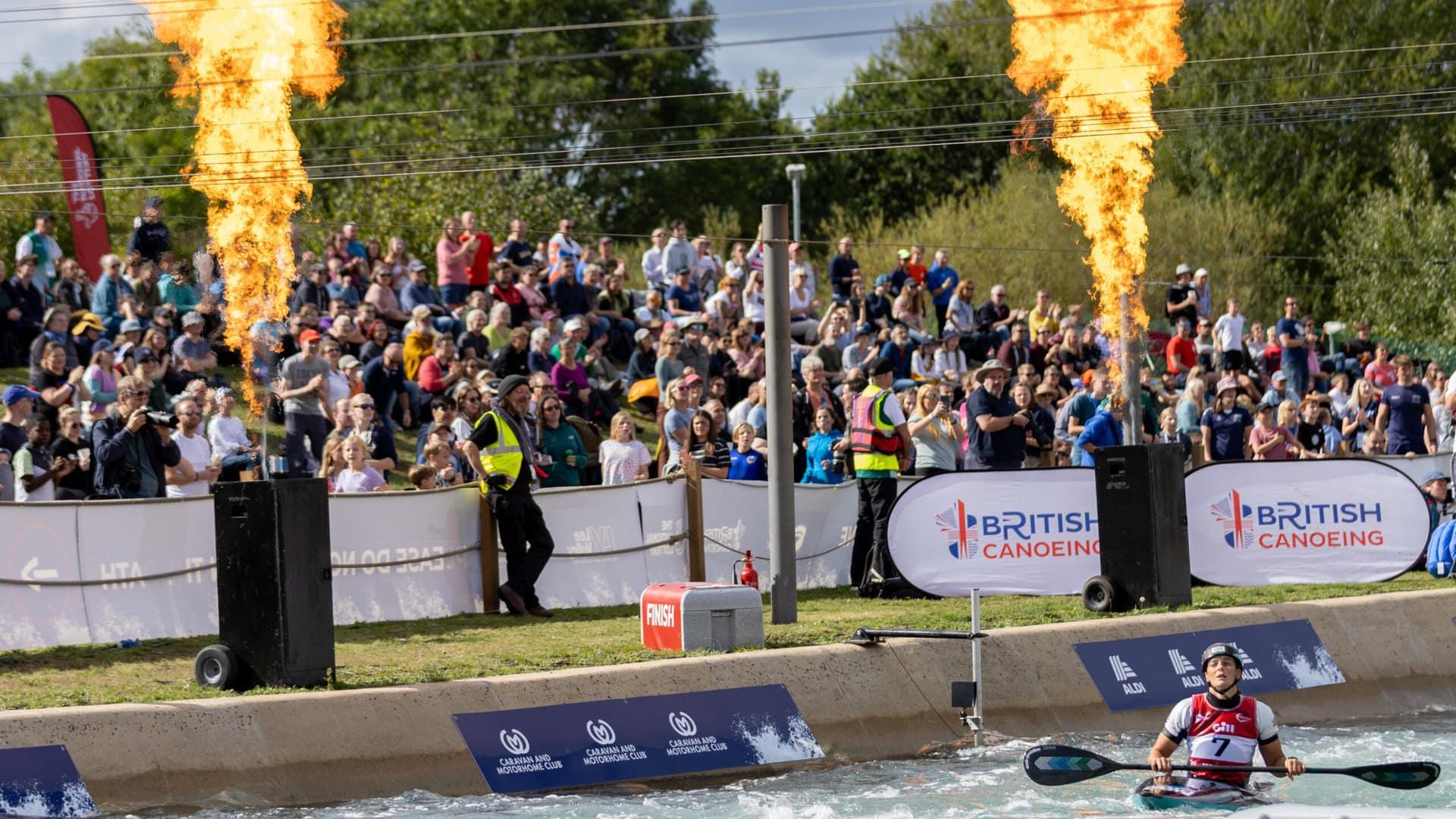 Flames firing upward to celebrate a race finish. Used on event toolkit Sports Presentation page.