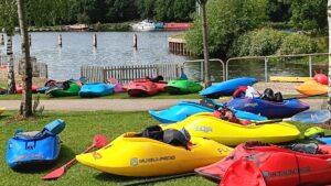 Colourful paddle craft at Holme Pierrepont.