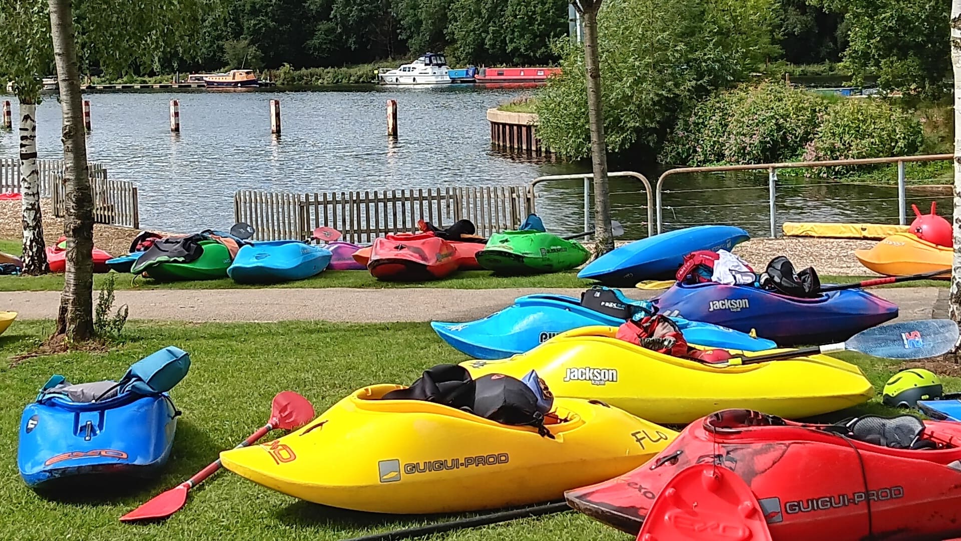 Colourful paddle craft at Holme Pierrepont.