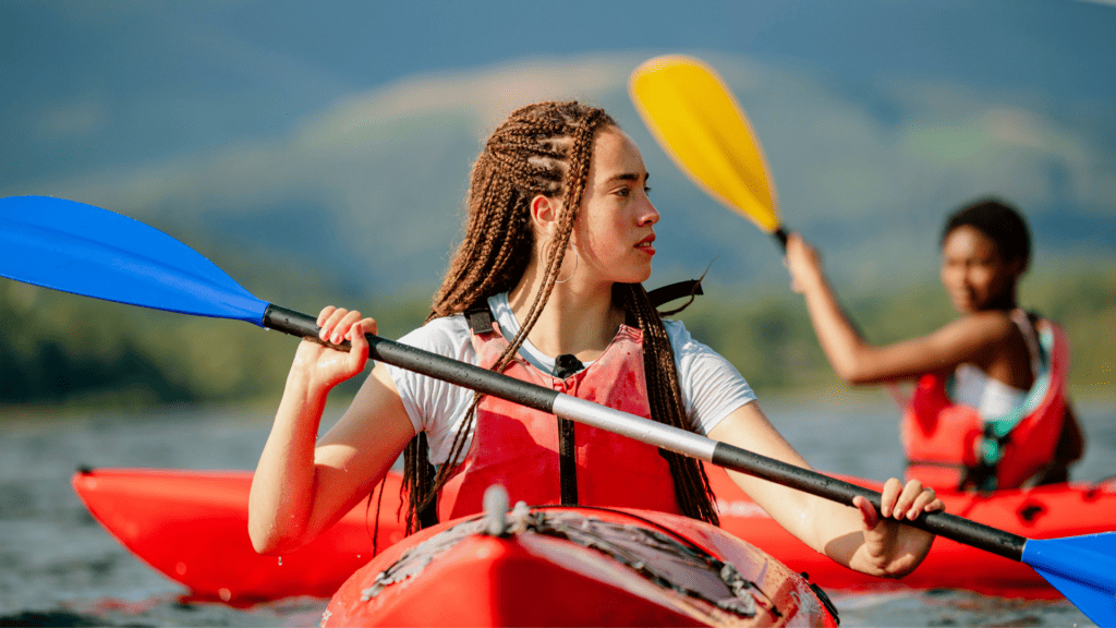 Woman in kayak on a lake