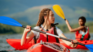 Woman in kayak on a lake