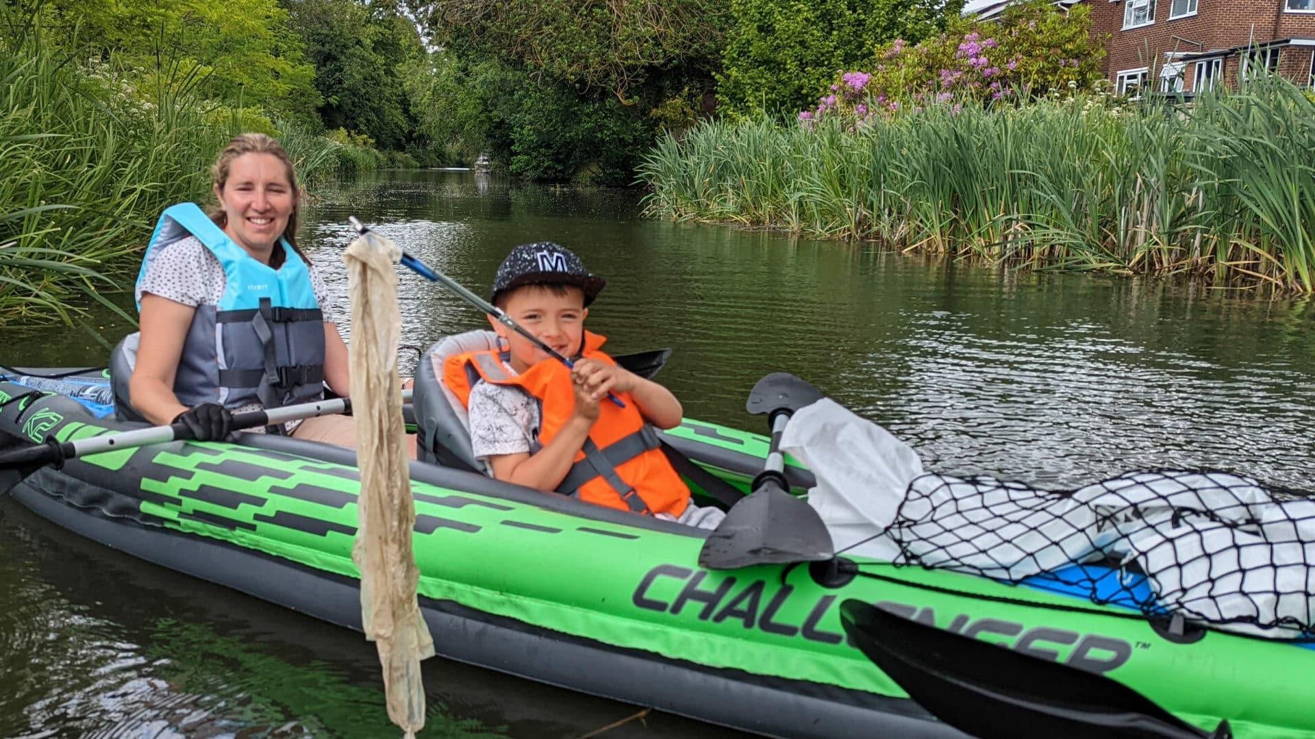 Two people taking part in the Big Paddle Cleanup