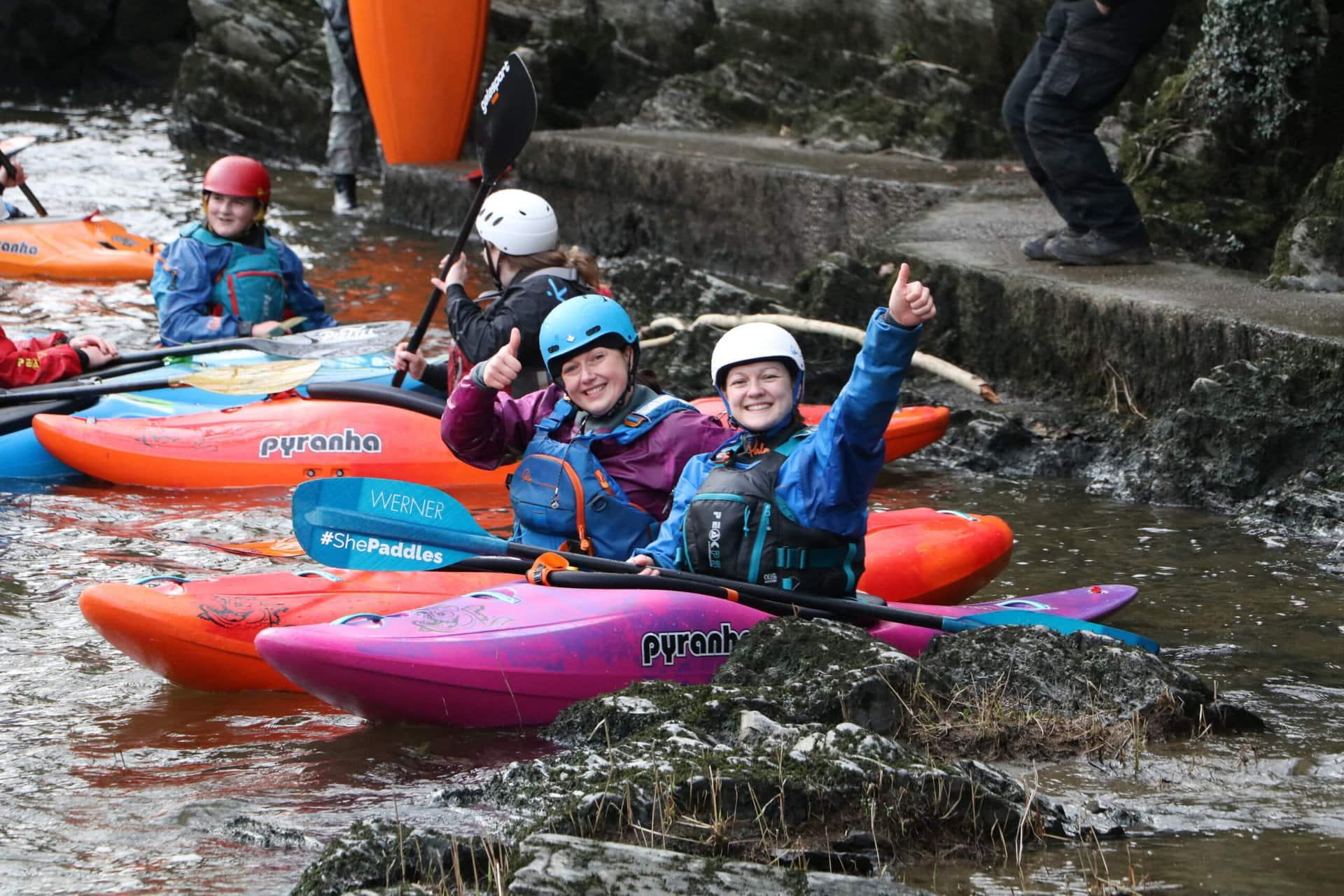 Meg Enynon white water kayaking