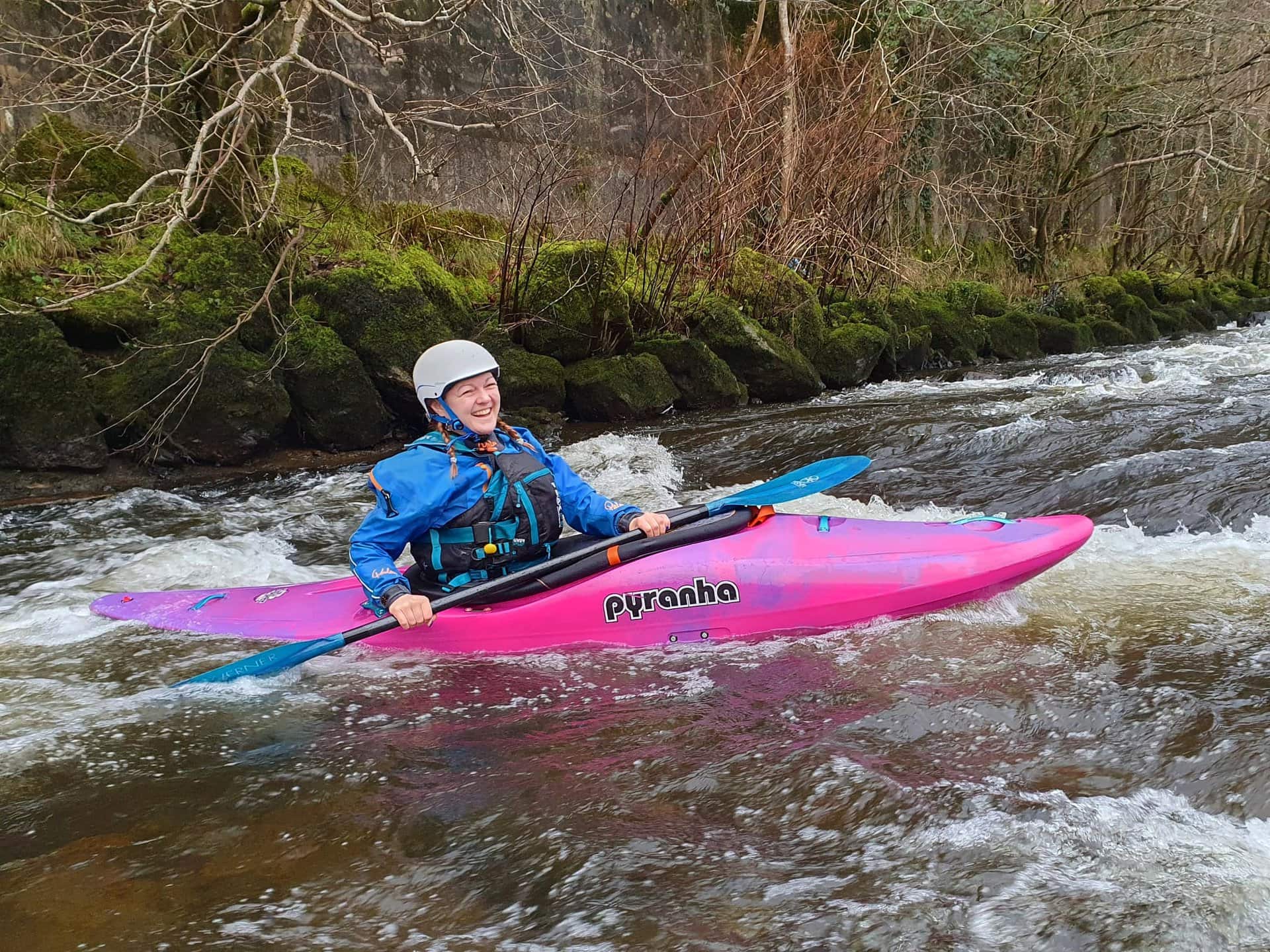 Meg Enynon white water kayaking