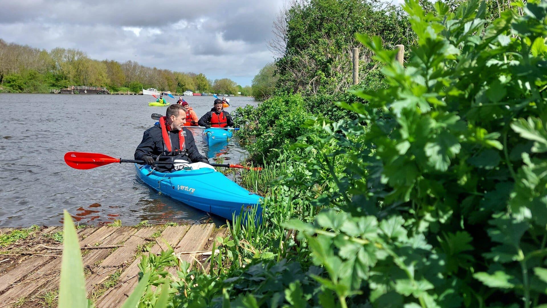 Athletes doing a cleanup on the River Trent