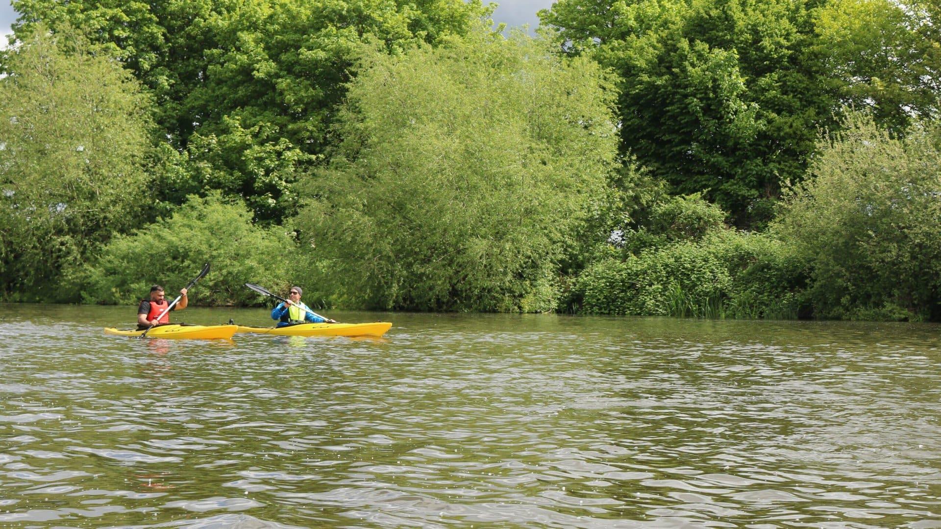 Two paddlers on a river