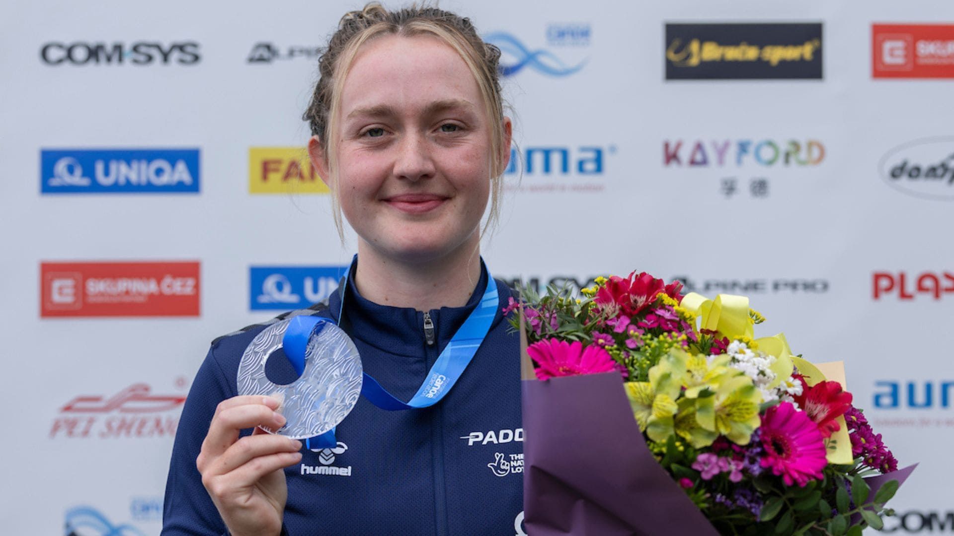 Nikita Setchell with the bronze medal for the Kayak Cross in Prague 2024