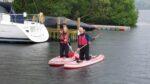 Tim Farron and daughter Gracie paddleboarding at Lake Windermere