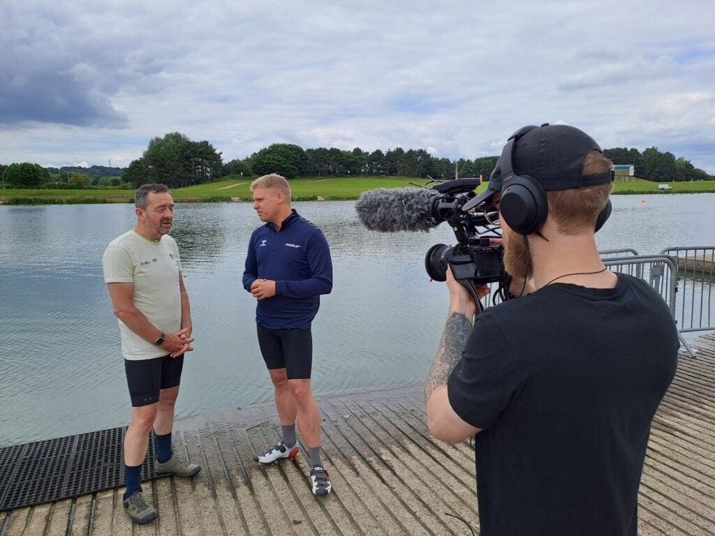 Chris Boardman and Ben Seal talk by the Regatta Lake