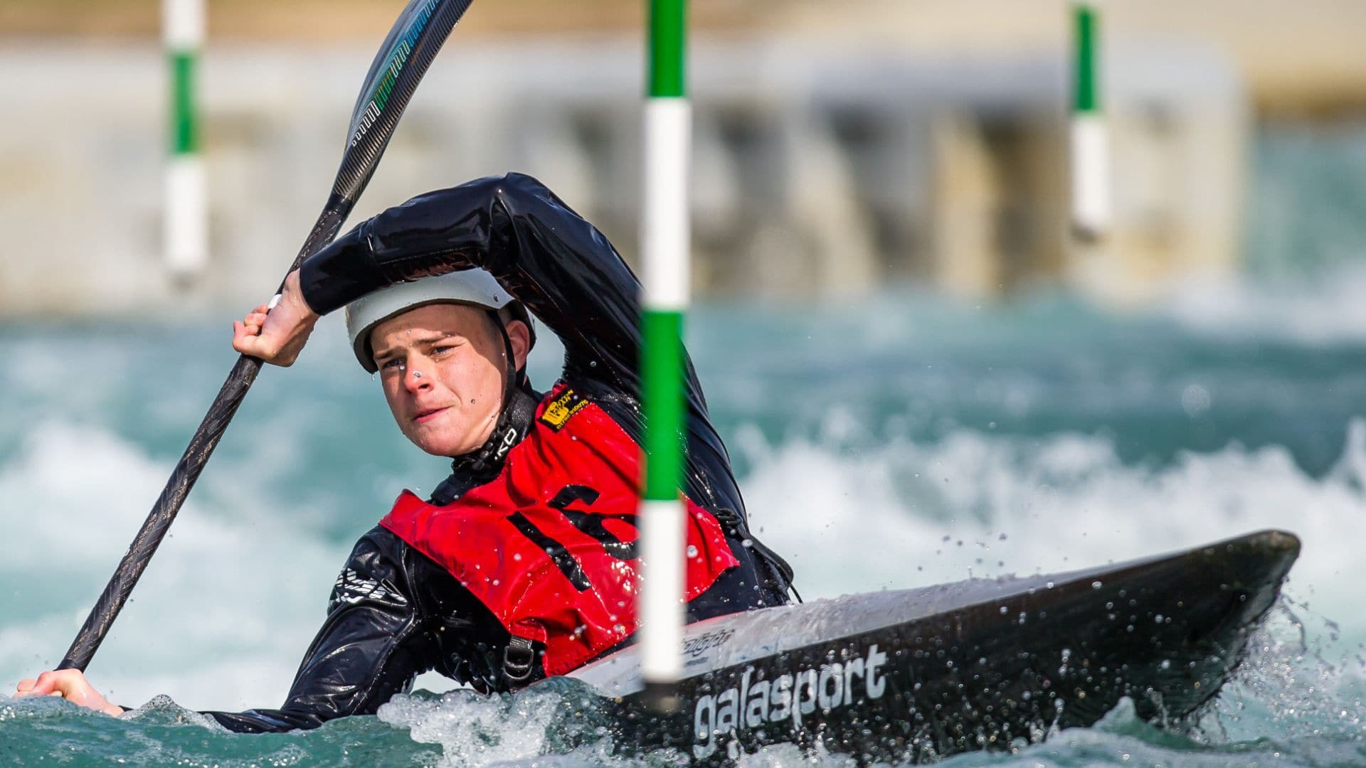 Scott Ritchie paddling canoe slalom at Lee Valley White Water Centre.