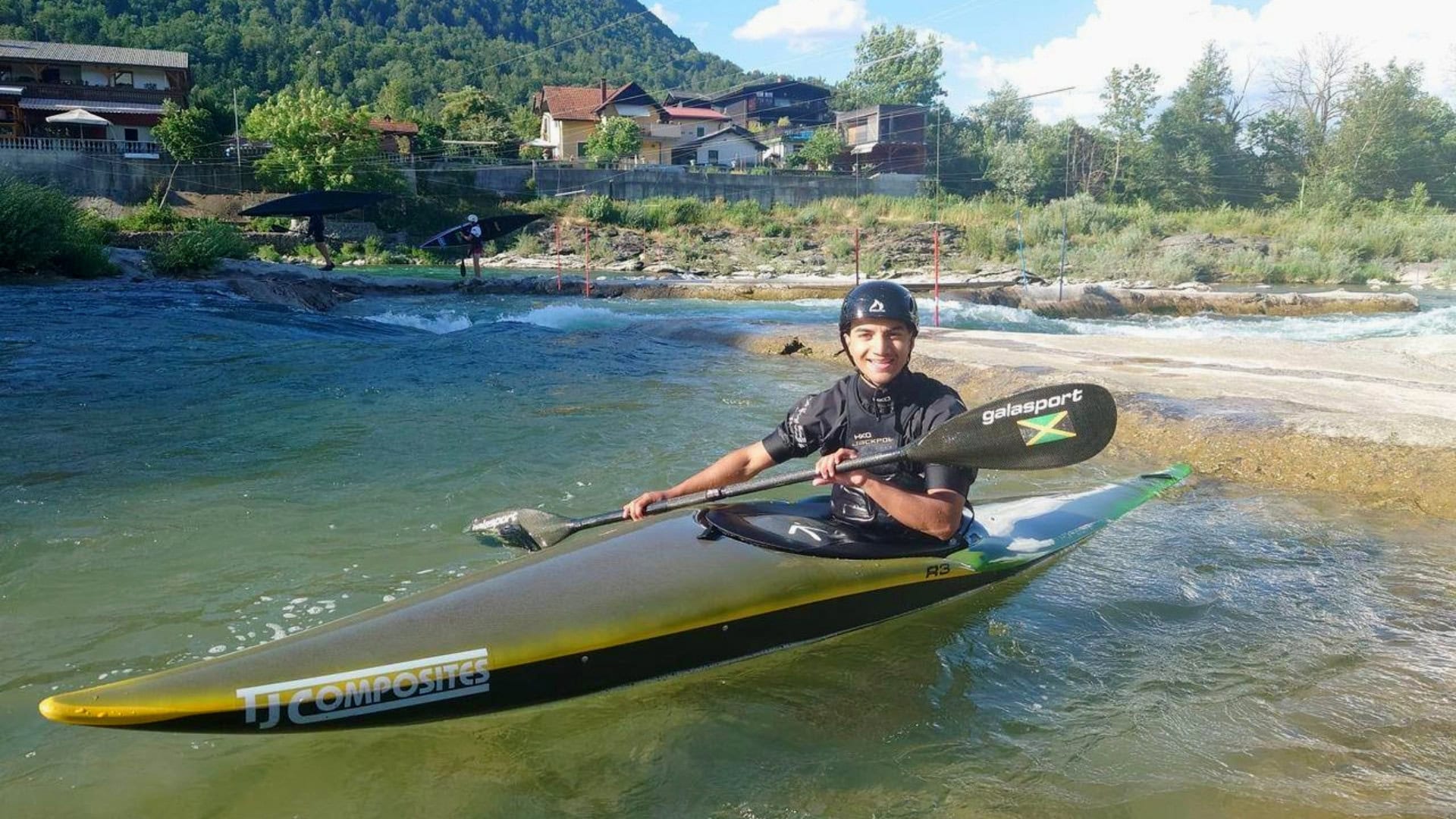Canoe slalom athlete, Solomon Maragh in his boat