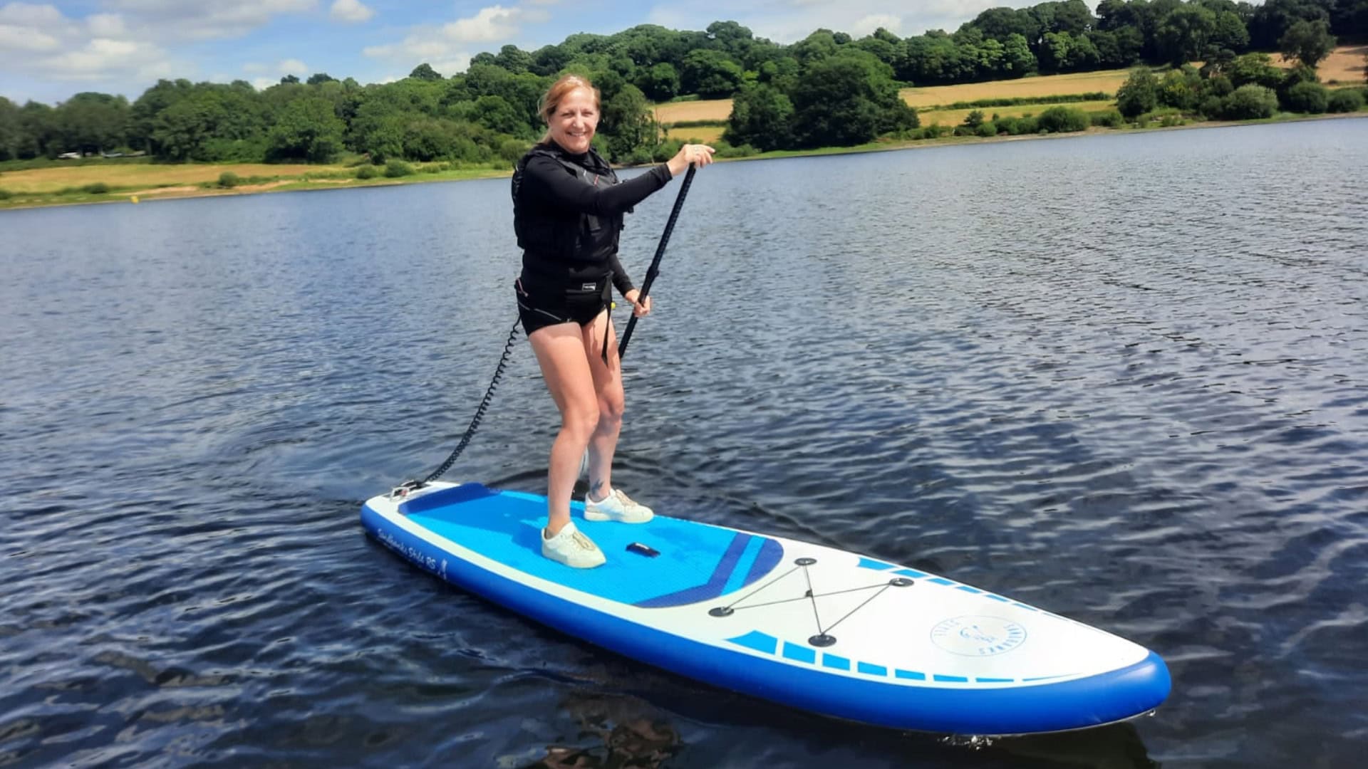Kate Allatt Paddleboarding at Ogston Sailing Club.