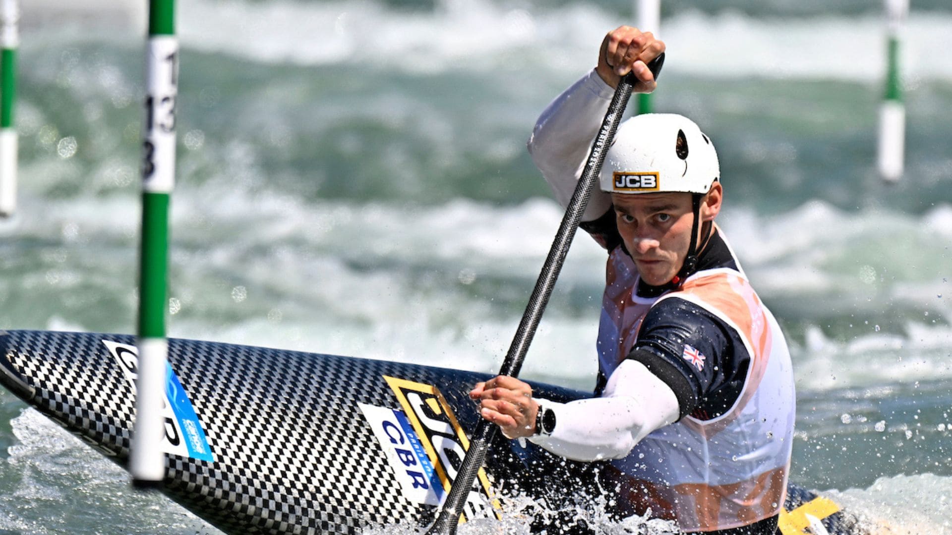 Adam Burgess competes in the C1 heats in Paris