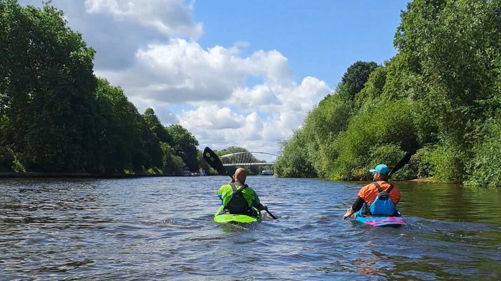 Paddlers exploring nature