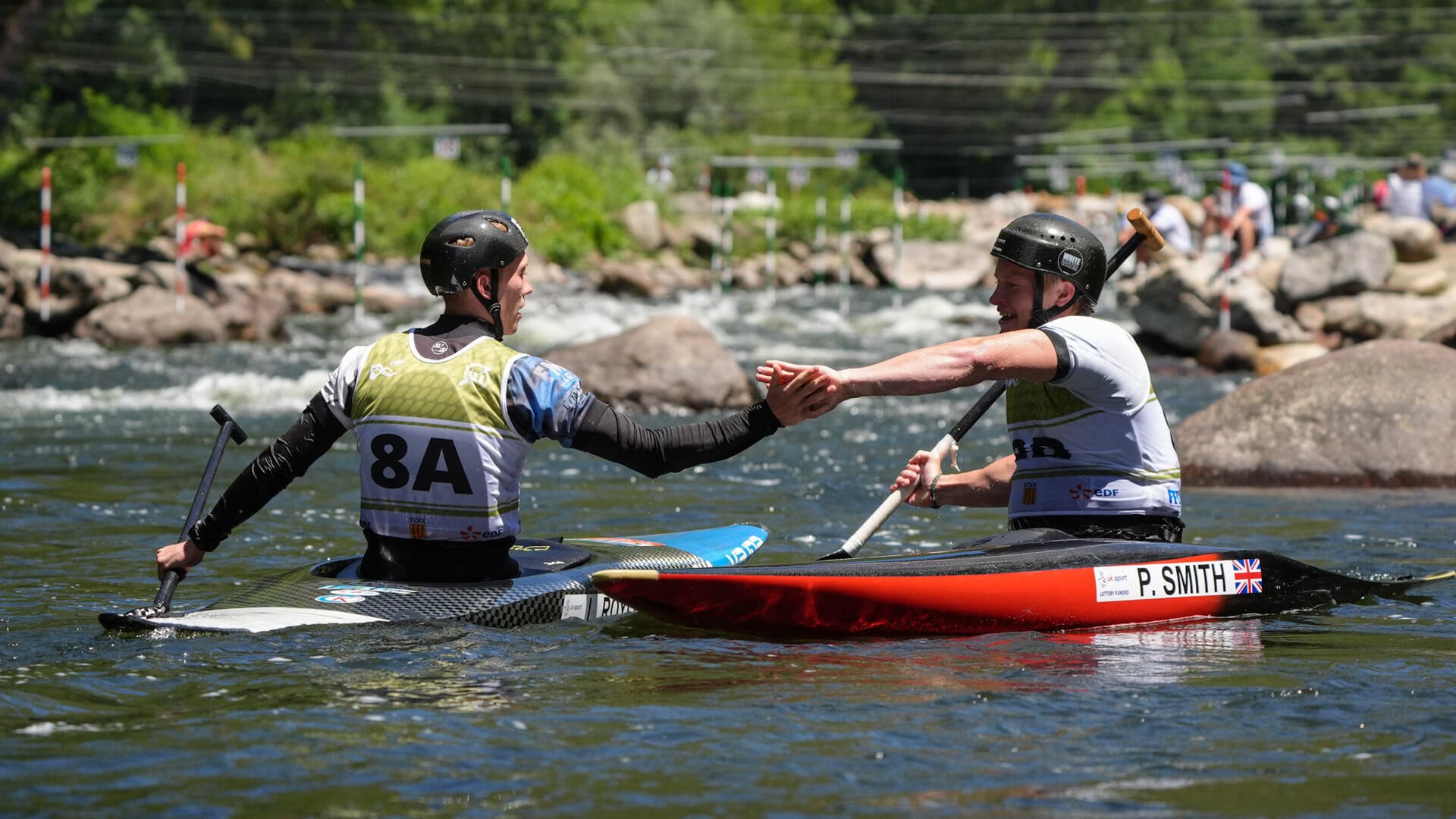 Royle amd Smith showing comradery on the water at Foix.