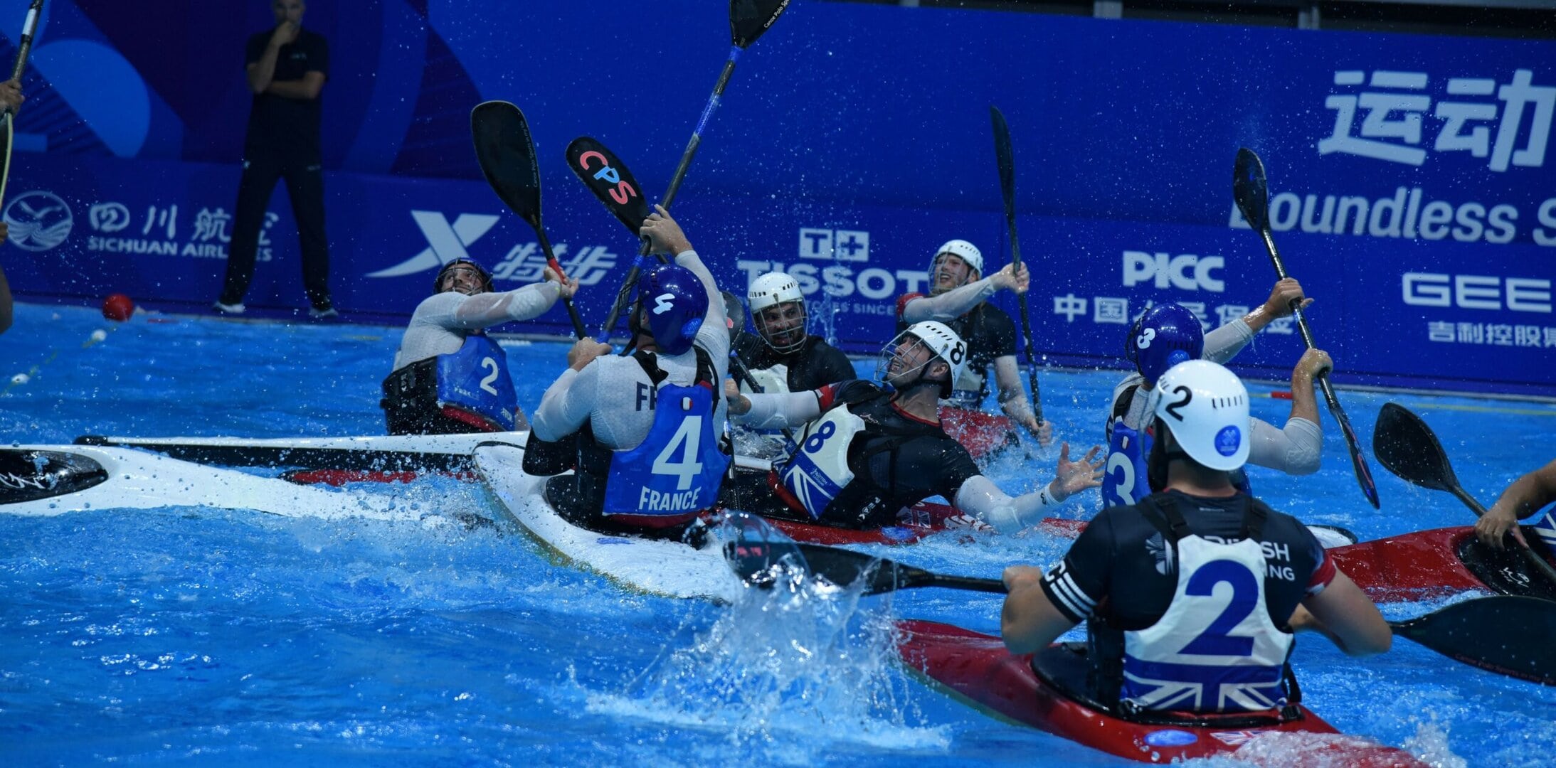 Canoe polo players on a pool