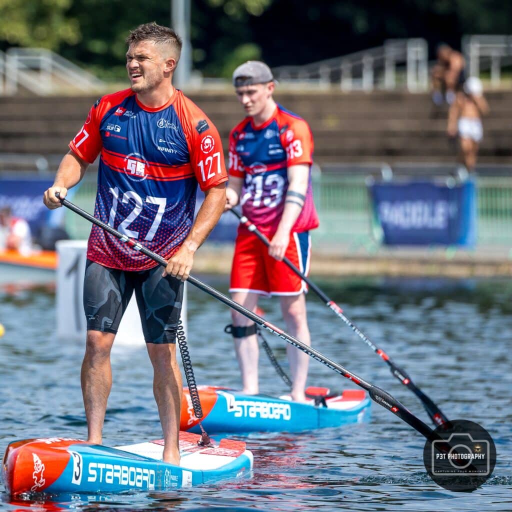 Two male SUP competitors