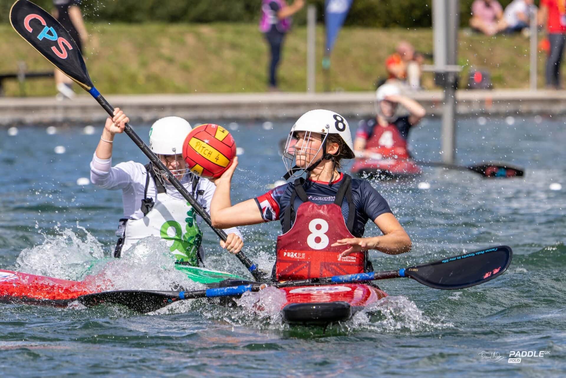GB polo player with ball in hand.