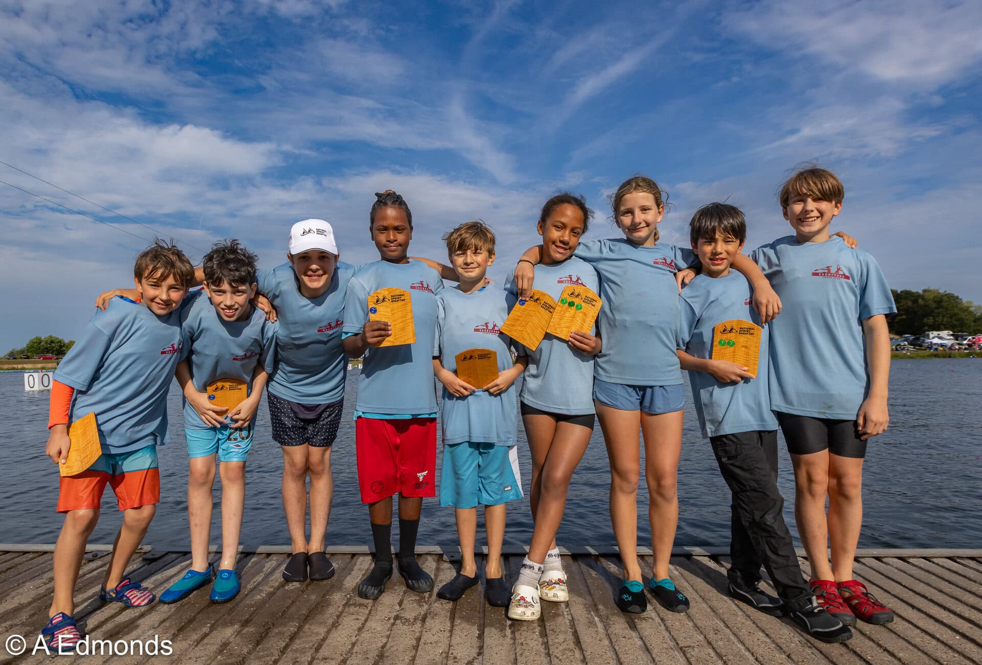 Brentford Canoe Club paddlers showing off their medals